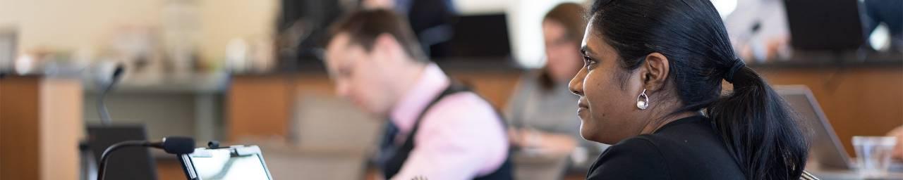 woman listening in class